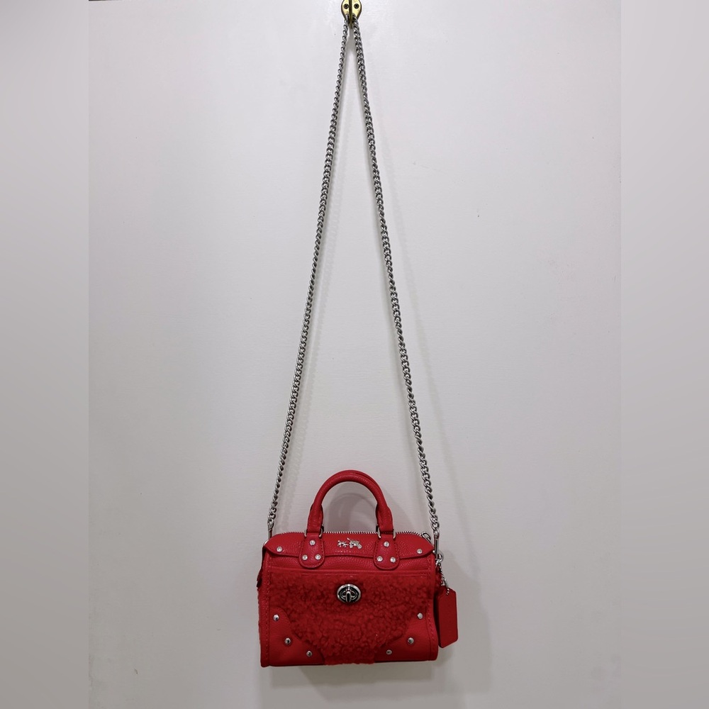 Coach mini Rhyder in Shearling in the color orange